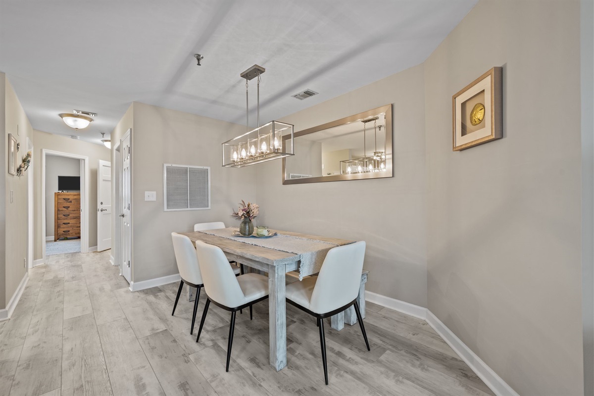 Dining area with seating for four&mdash;perfect for family meals or game nights