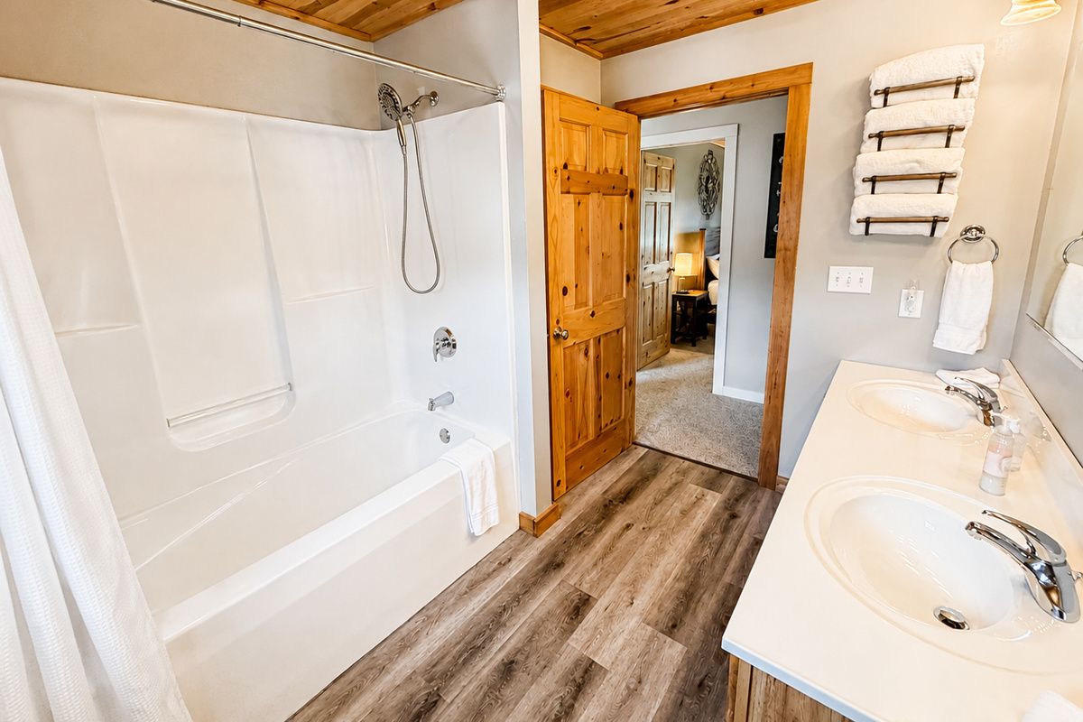 Full bathroom with a shower and tub combination just steps from the two upstairs bedrooms makes life easy.
