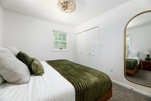 Our king room has a full closet, a full length mirror, and charging stations.