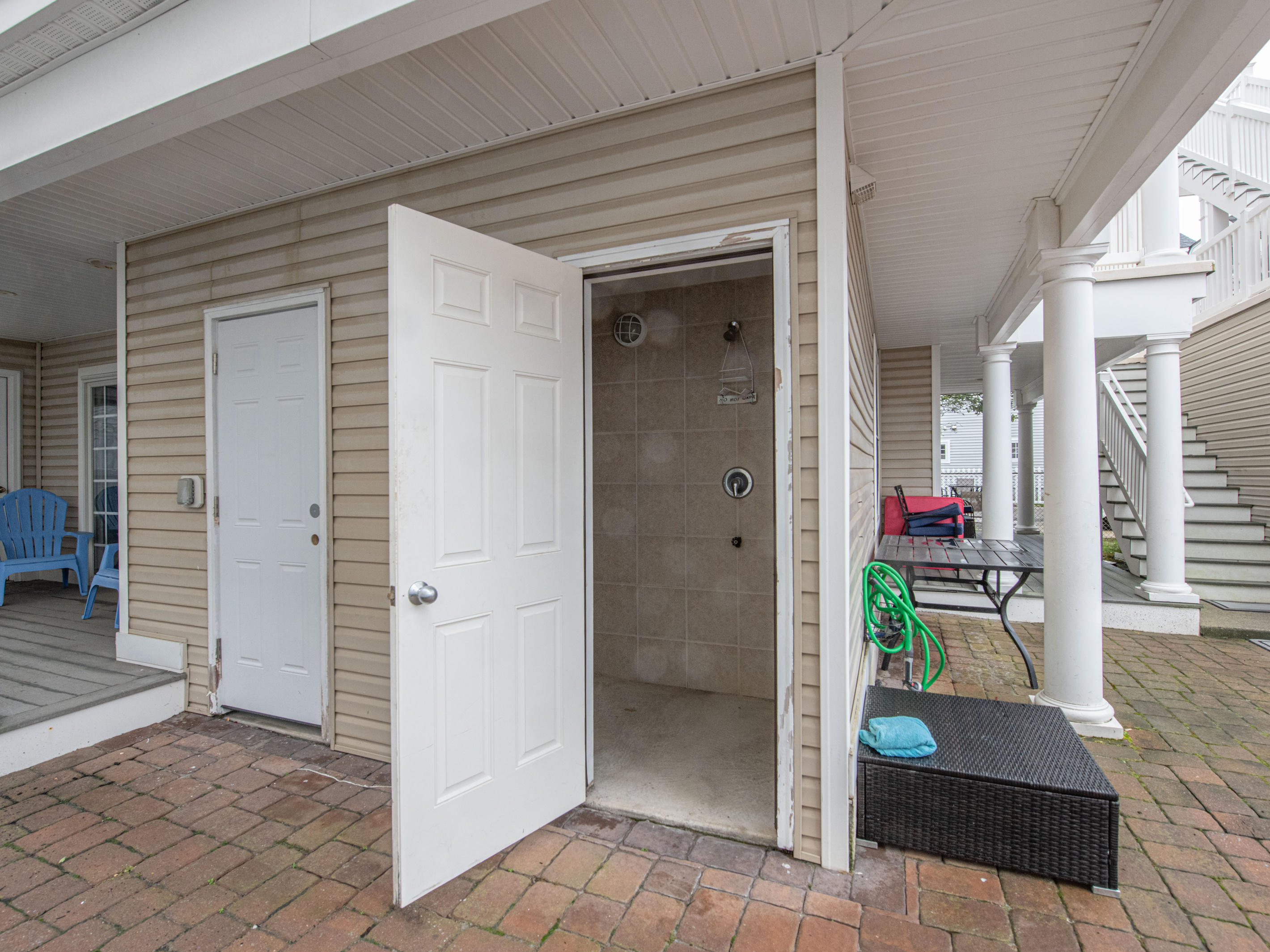Outdoor Enclosed Shower Stall and Lower Patio Storage Area