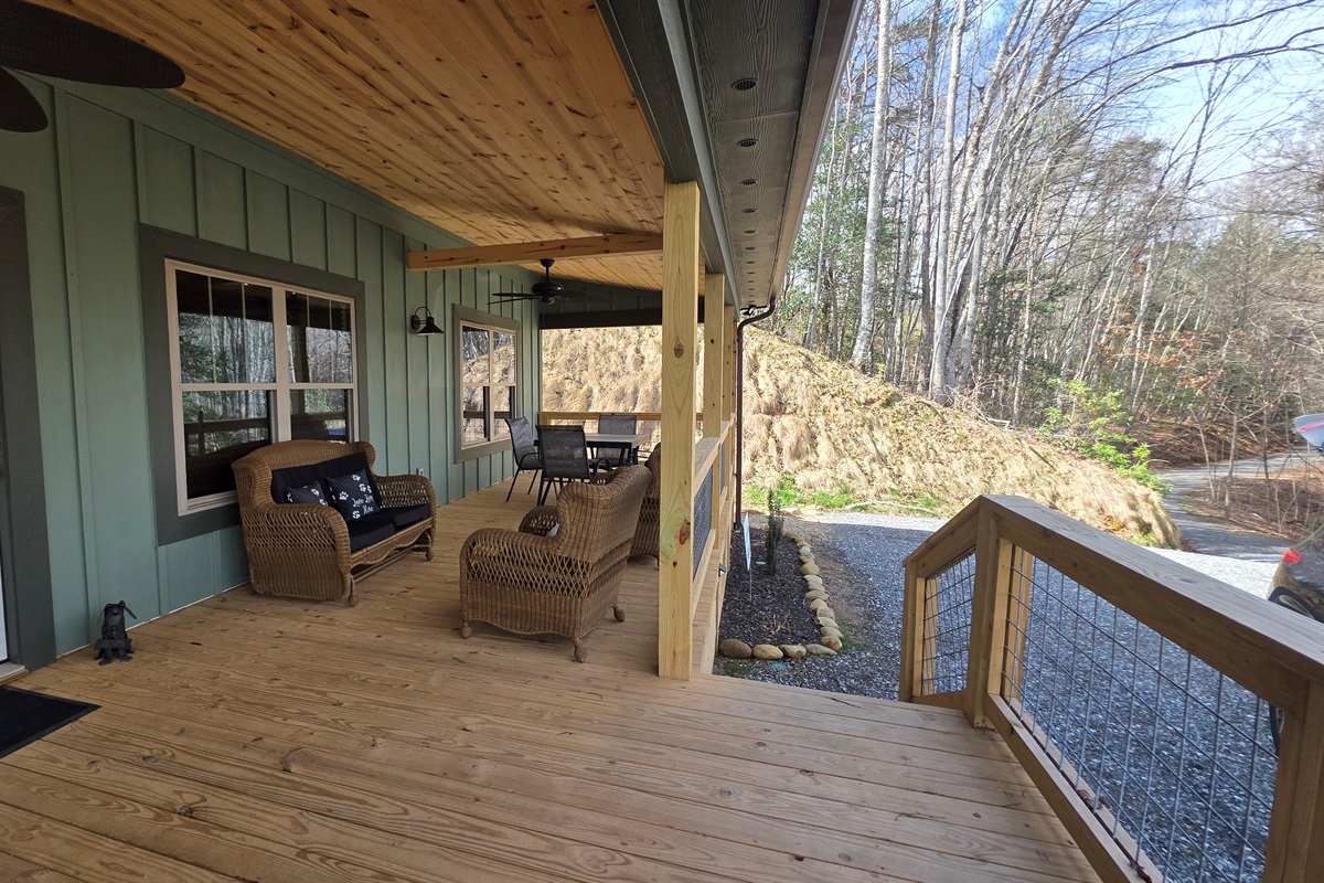 Outdoor dining on the large covered porch.