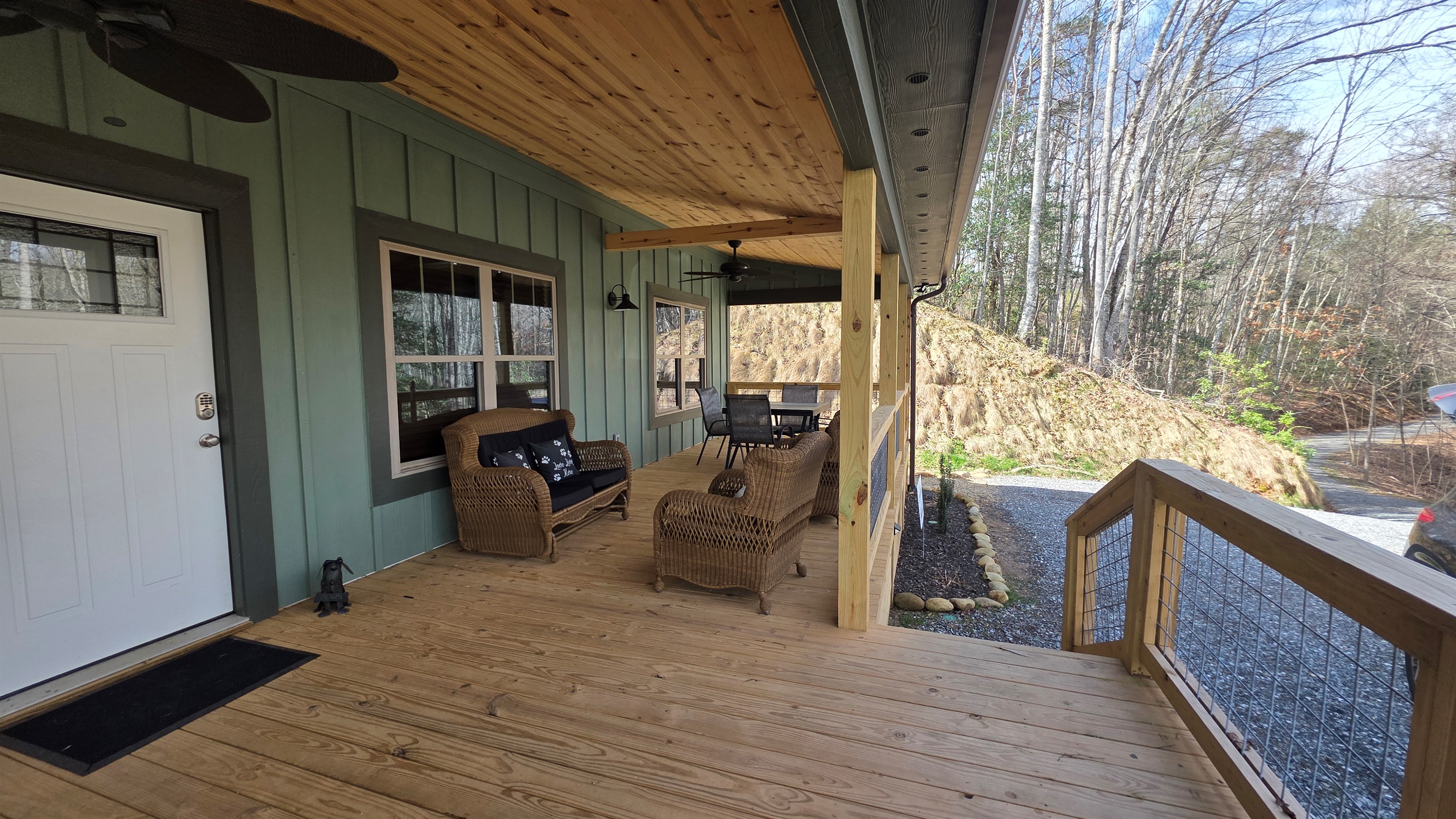 Outdoor dining on the large covered porch.