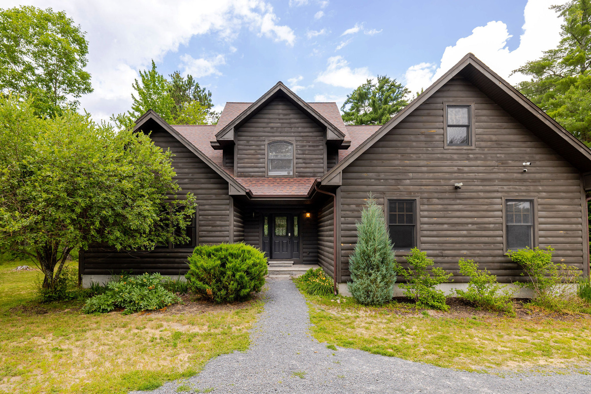 Welcome to your Adirondack escape—a beautifully crafted log-style home offering comfort, privacy, and easy access to the region's best outdoor adventures.