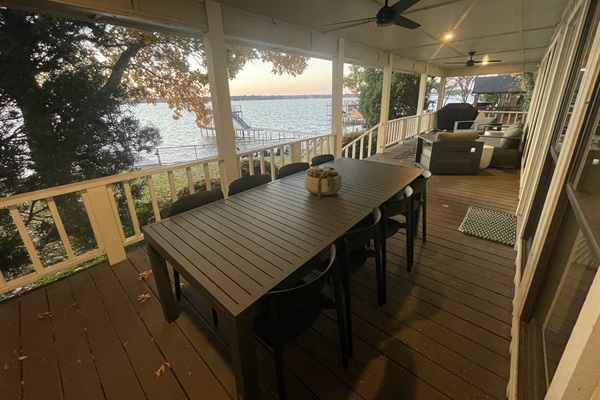 Relax and dine on the back deck overlooking the Lake