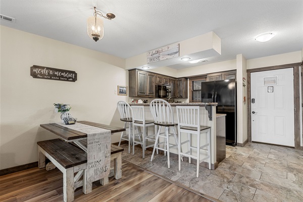 Kitchen, breakfast bar, kitchen table. Full size fridge (New for 2026)