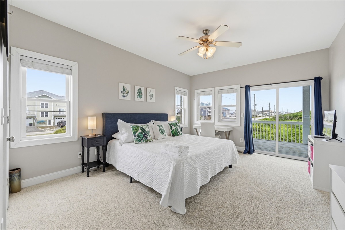 Spacious king suite with private deck access and peaceful views
