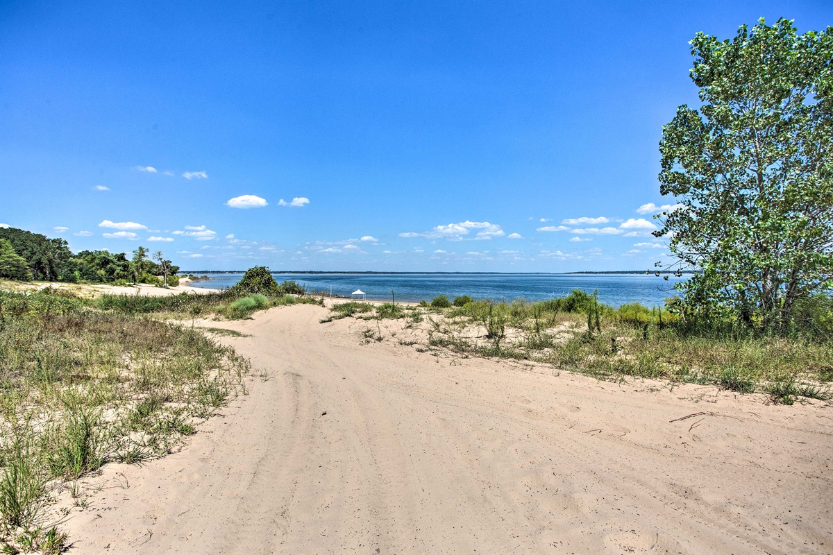 Enjoy the soft sand on the soles of your feet just steps away from Serenity Sands!