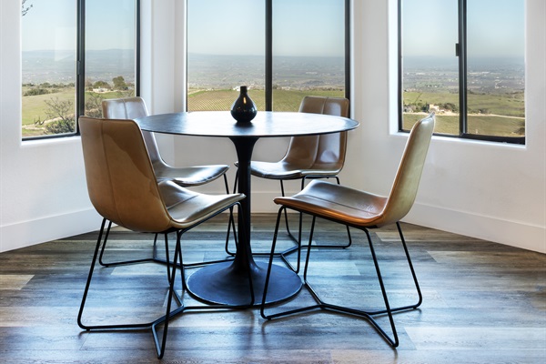 Possibly the best seat in wine country. This intimate four-person turret nook is wrapped in panoramic windows overlooking the vineyard and the entire Paso Robles valley — where every meal feels like a special occasion.