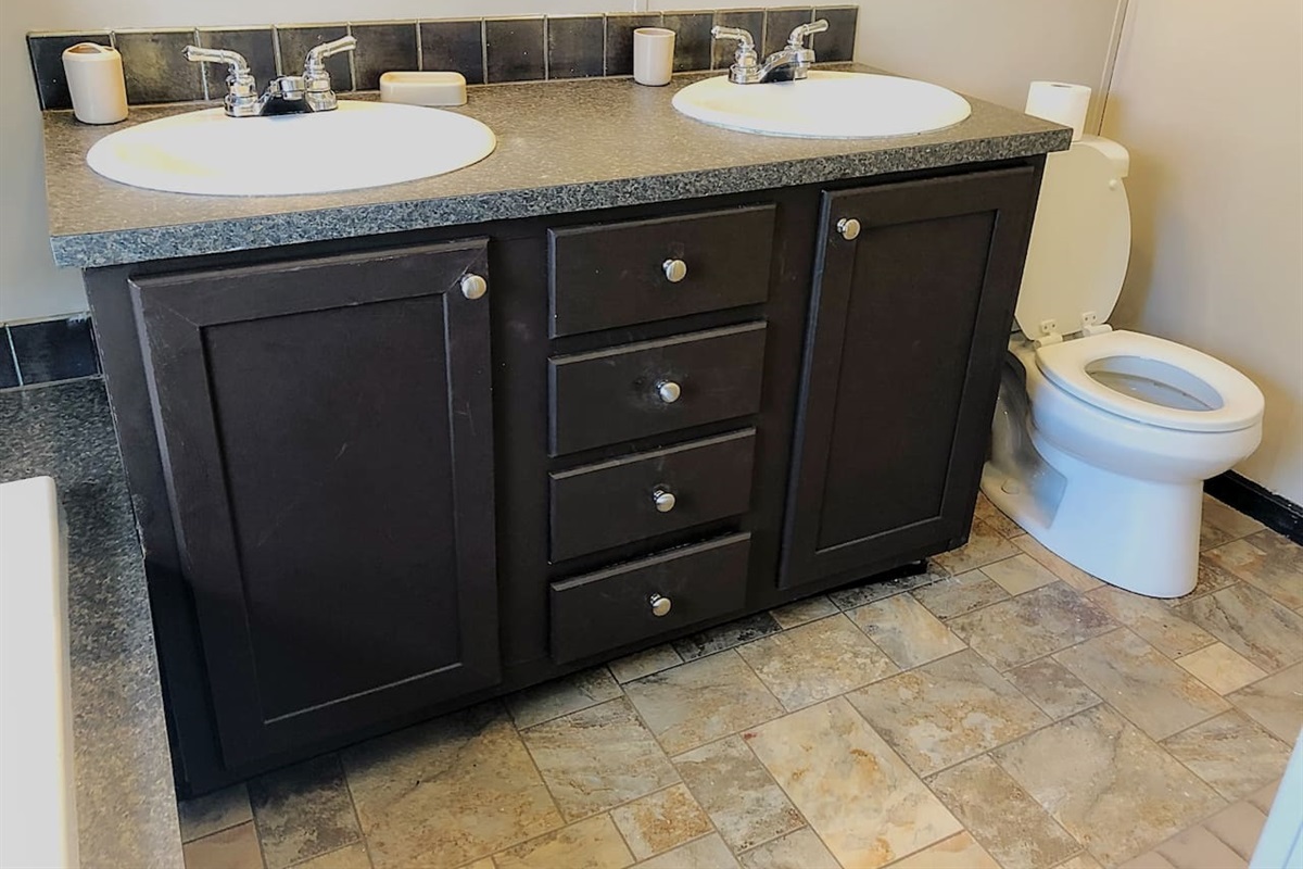 Master bath vanity with double sinks. 
