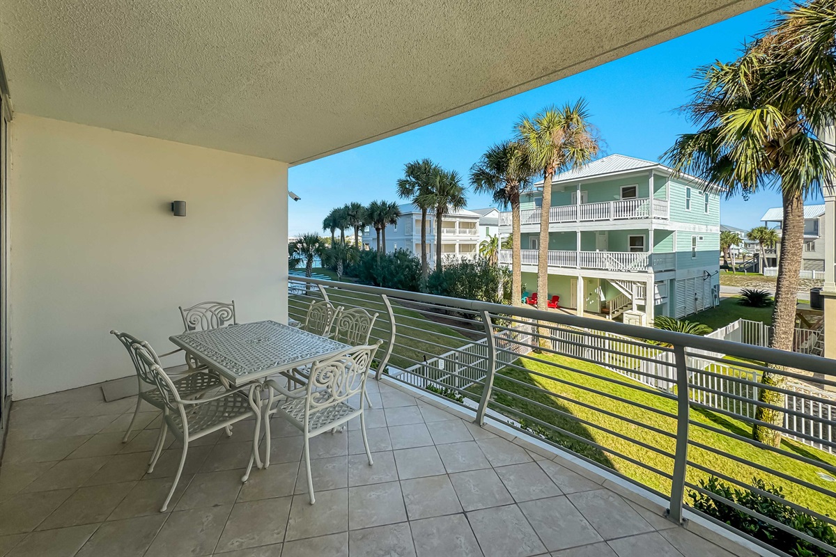 Step out onto your covered terrace and take in the charming neighborhood setting. Experience true coastal tranquility at Bella Luna 110