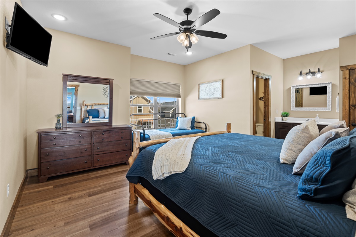 Upper level king bedroom with twin bed with en suite shower 