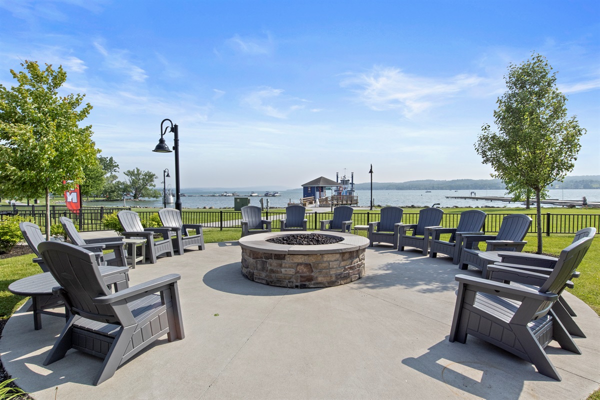 Gather around the fire pit with a view—perfect for cozy evenings by the water
