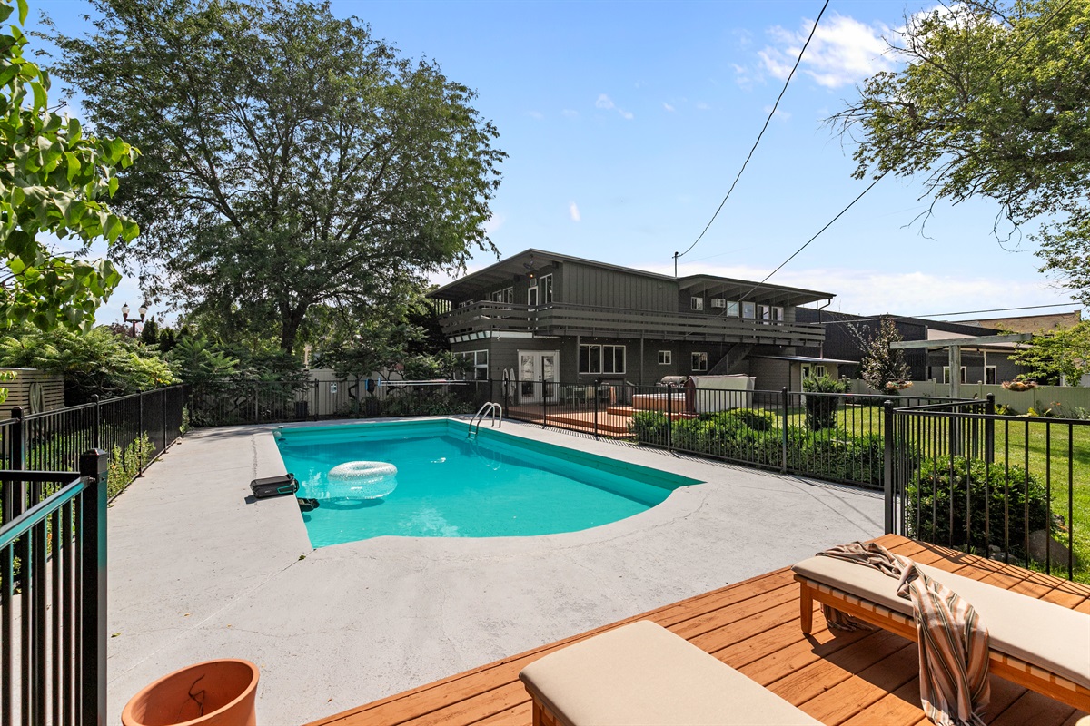 The spacious yard is perfect for the kiddos to run, play, and enjoy the outdoors while you relax nearby