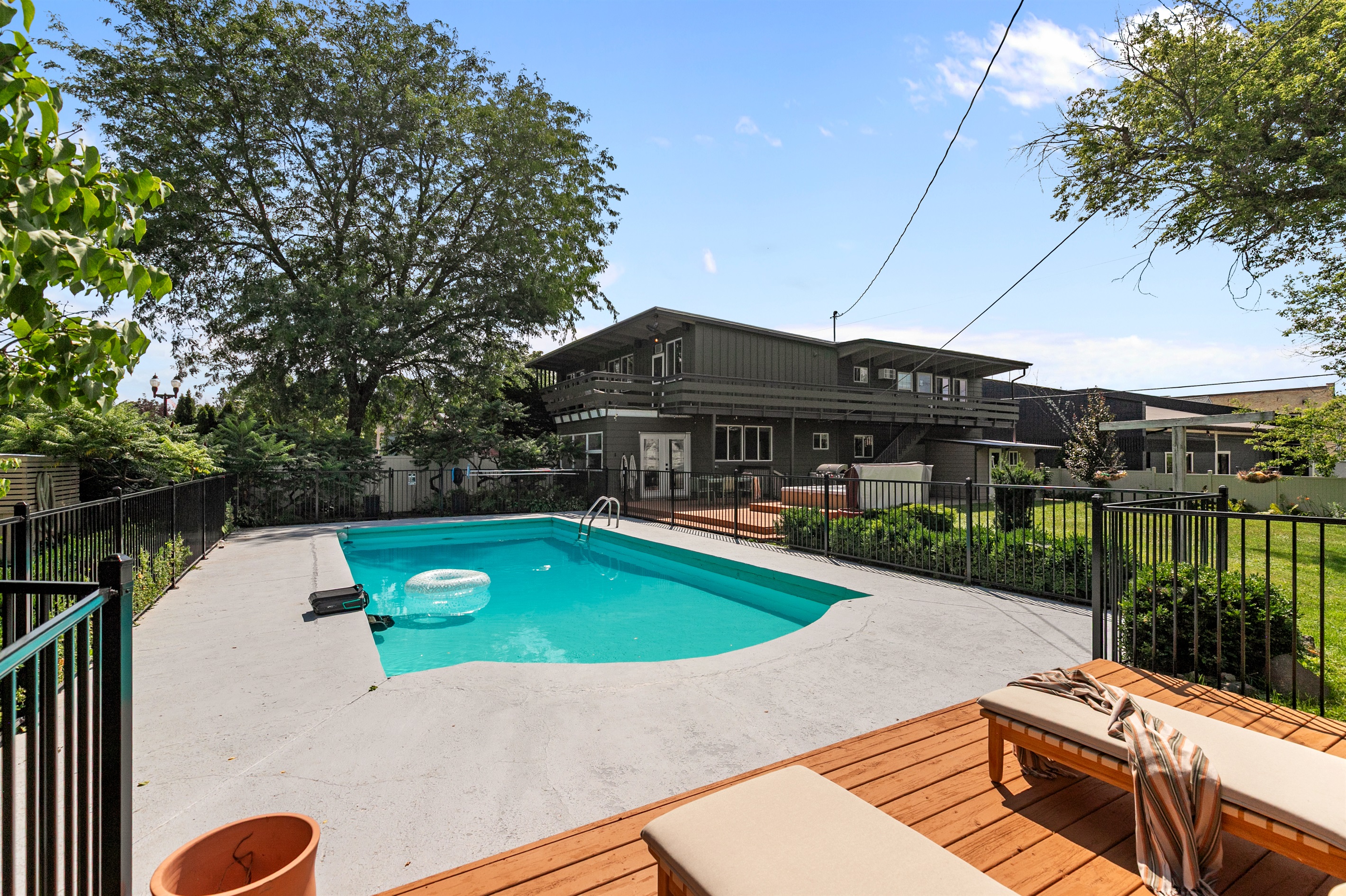 The spacious yard is perfect for the kiddos to run, play, and enjoy the outdoors while you relax nearby
