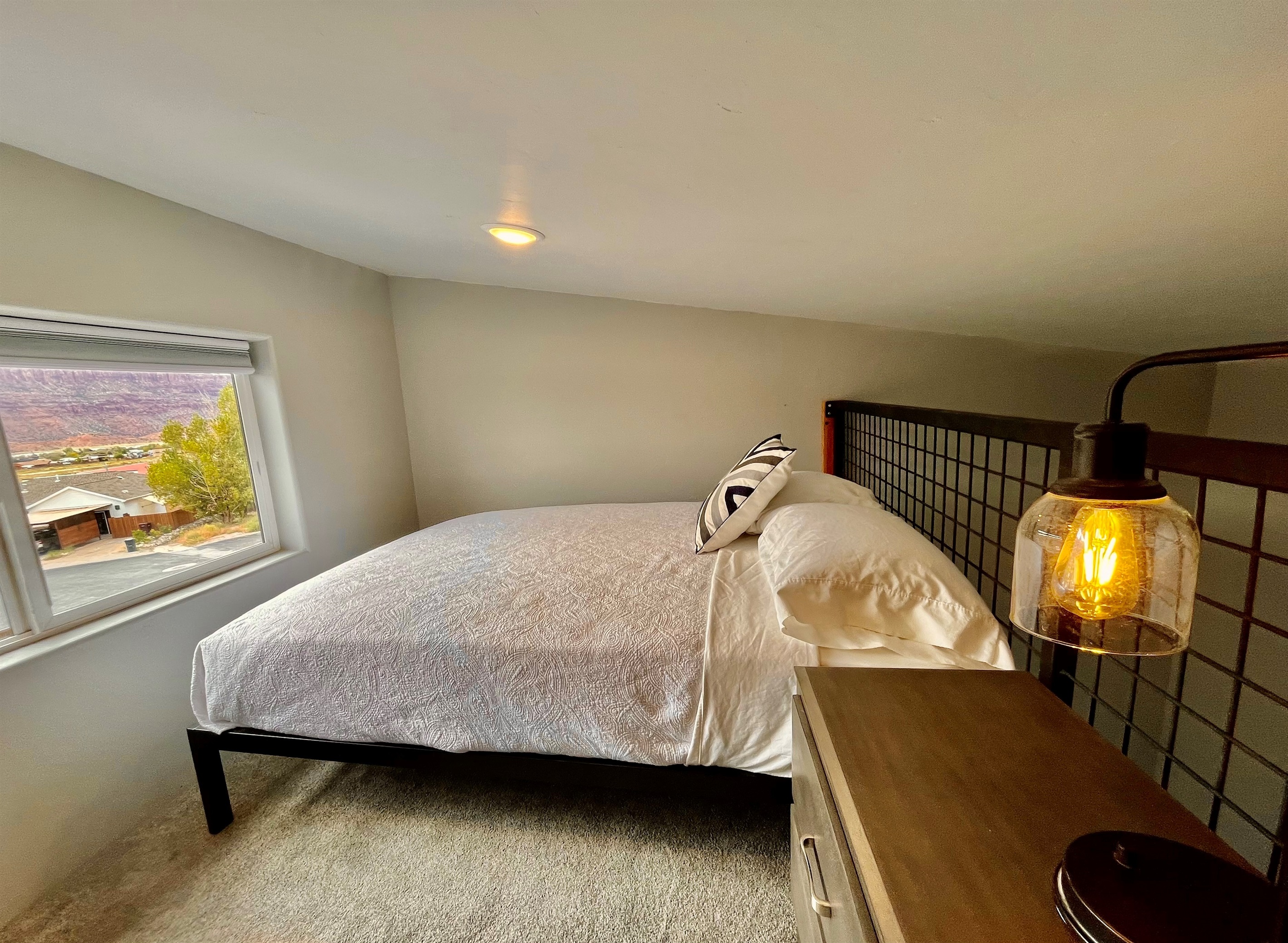 Queen bed in loft