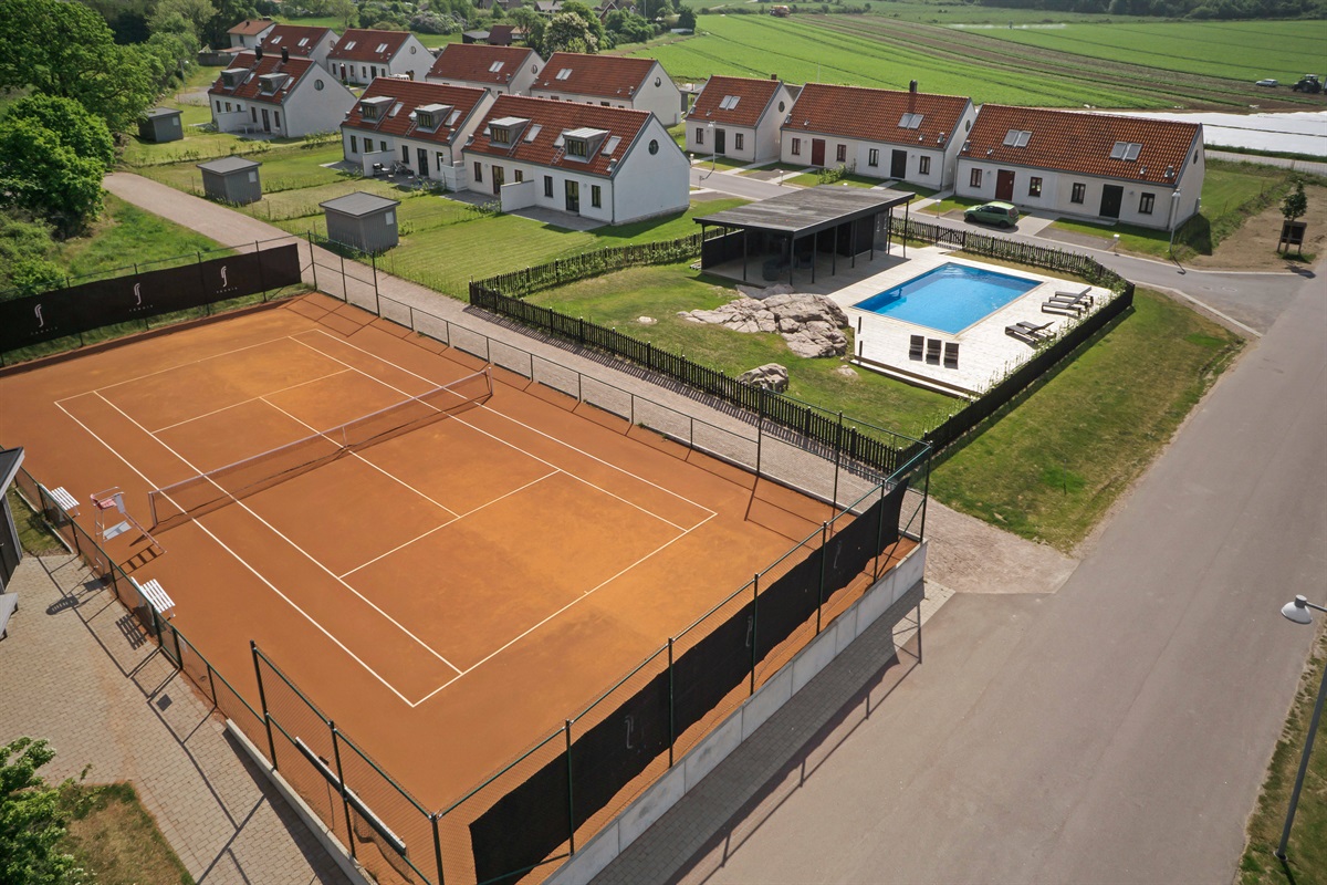 Tennis court and pool.