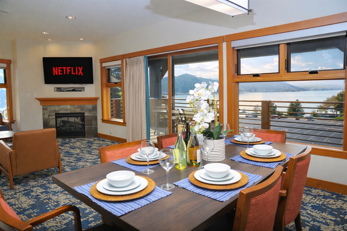 Bar area and open dining room. Dining table seats 6, bar area seats 3