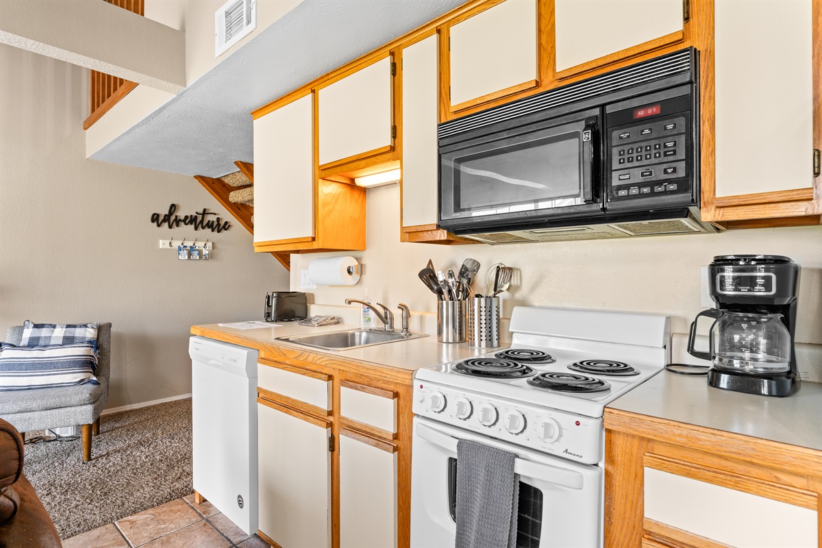 Cook without missing the conversation in this open kitchen layout.