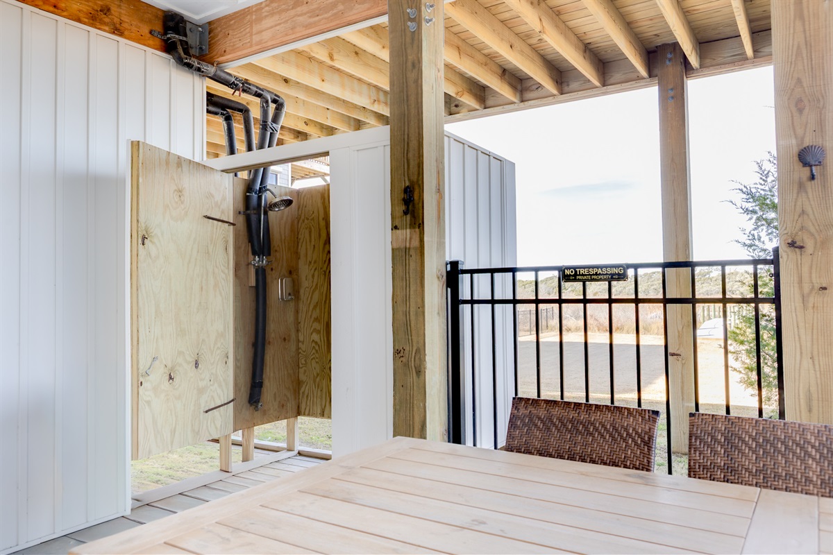 Freshen up outdoors: enjoy our private outdoor shower&mdash;ideal for sandy feet, salty hair, and effortless coastal living