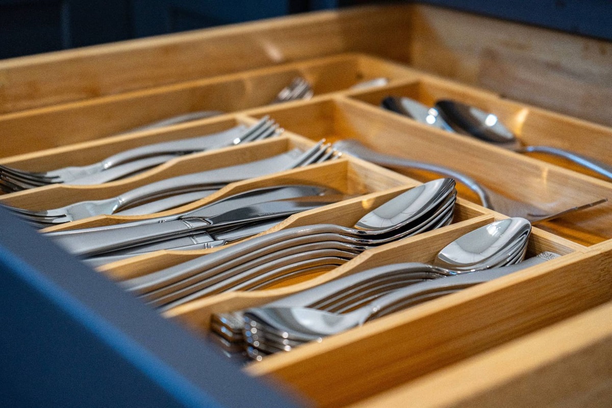 Organized flatware and fully equipped kitchen essentials for a seamless, at-home experience