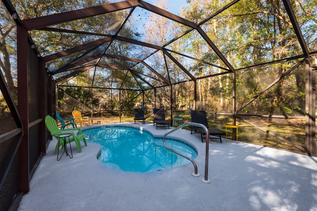 Beautiful outdoor pool inside the connect lanai. Three sun-loungers and side tables, perfect for pool-side book reading or sunbathing!