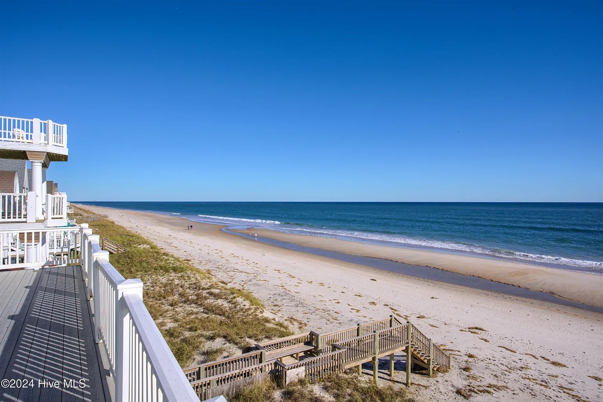 Step onto the private deck to enjoy unobstructed panoramic ocean views