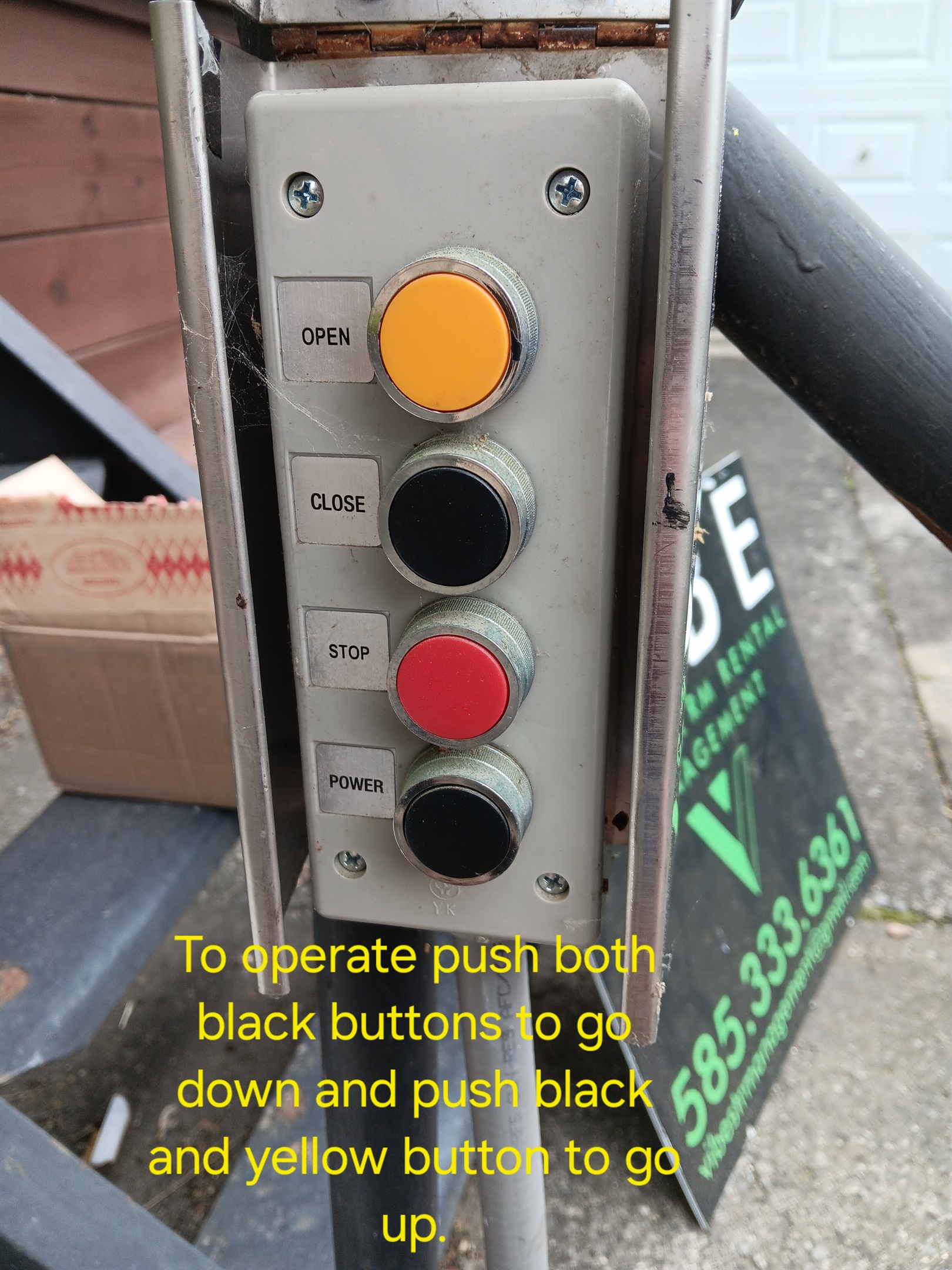 To operate tram push both black buttons to go down and black and yellow to go up