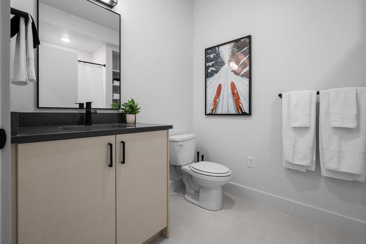 Stylish full bathroom with modern finishes.