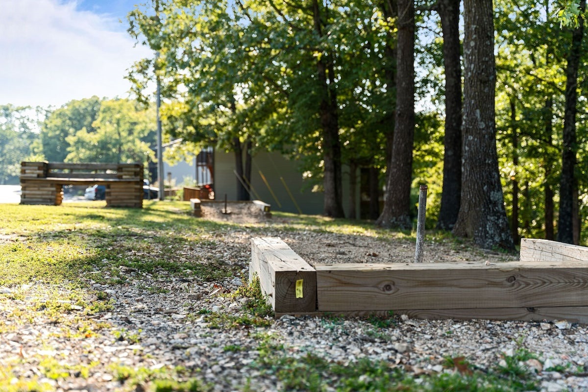 Enjoy playing horse shoes while on property (near the pool and playground)