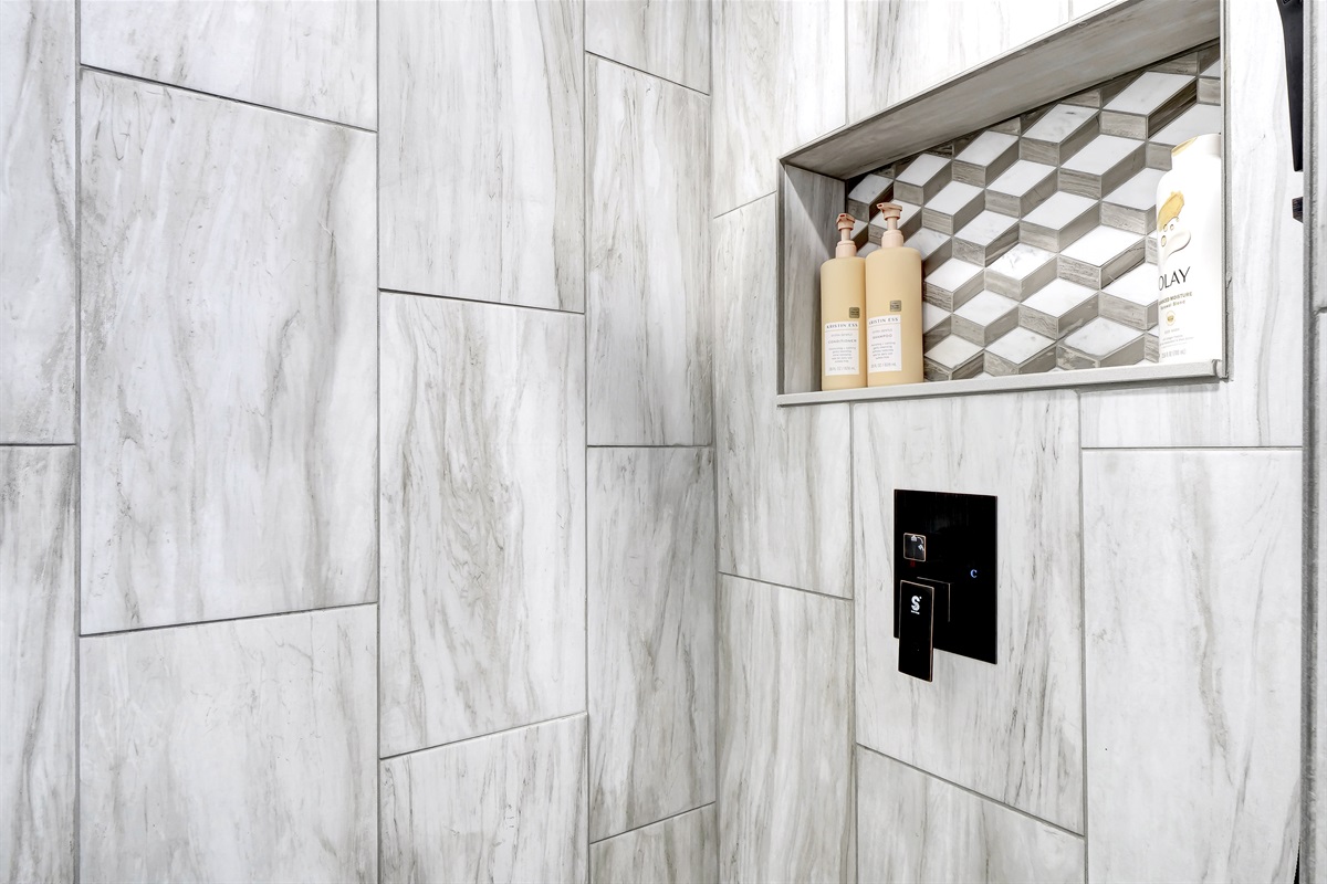 Each bathroom is fully stocked with shampoo, conditioner, and bodywash