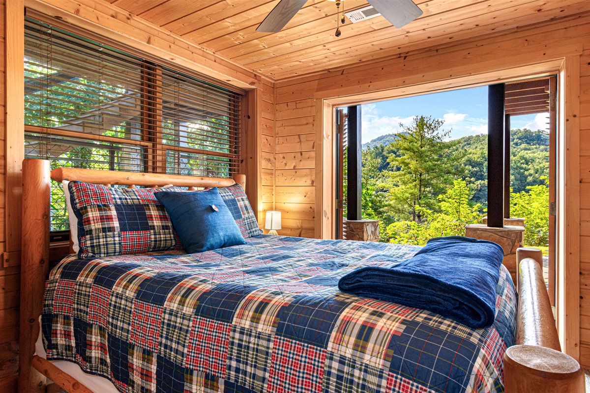 Downstairs Bedroom 2: Stunning mountain views from every angle create a tranquil escape!