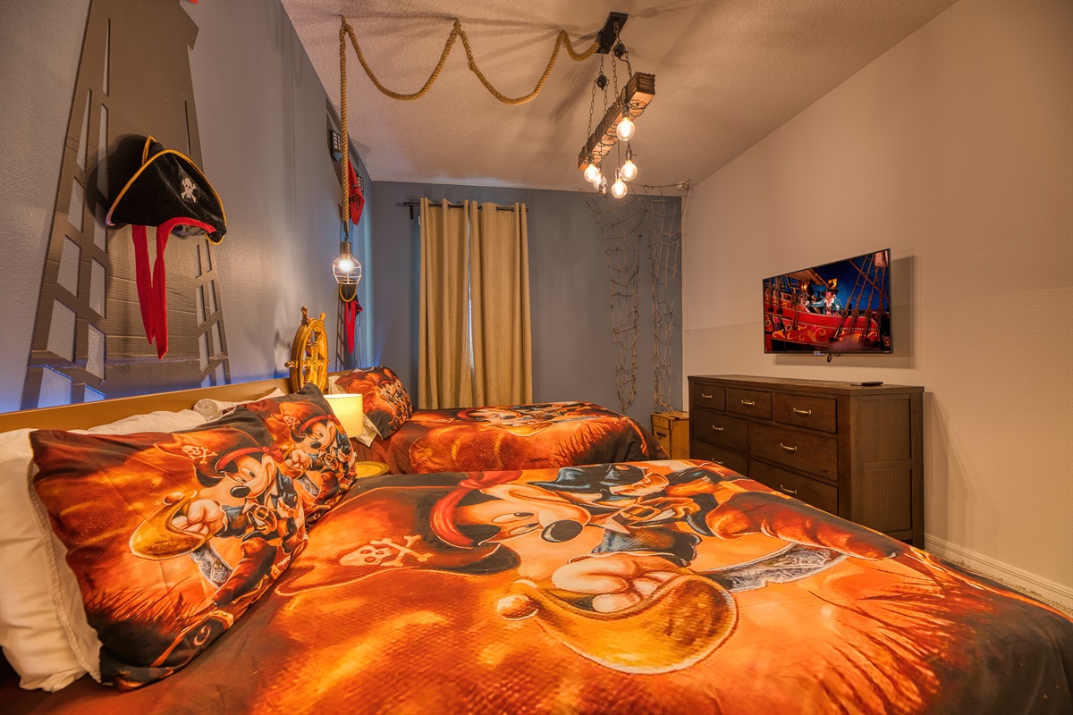Bedroom 5 is Mickey’s Pirate room w/ two double beds and a fun place to play!