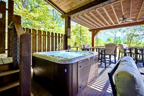 Soak your cares away in the private jetted hot tub overlooking the peaceful pond.