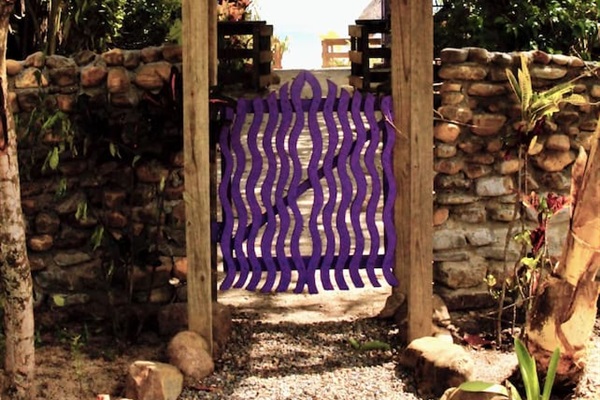 View of Casa Beya's front entrance from the road.