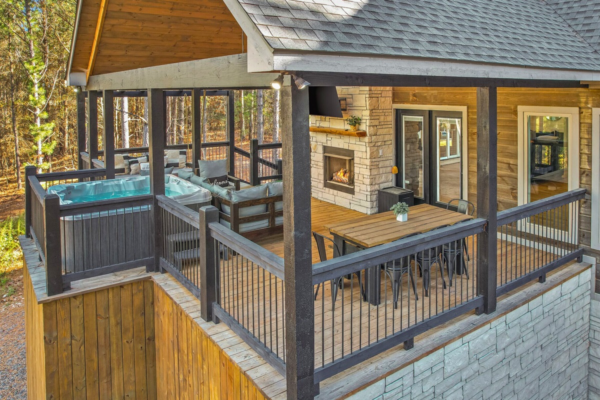Elevated deck view overlooking treetops and forest canopy.