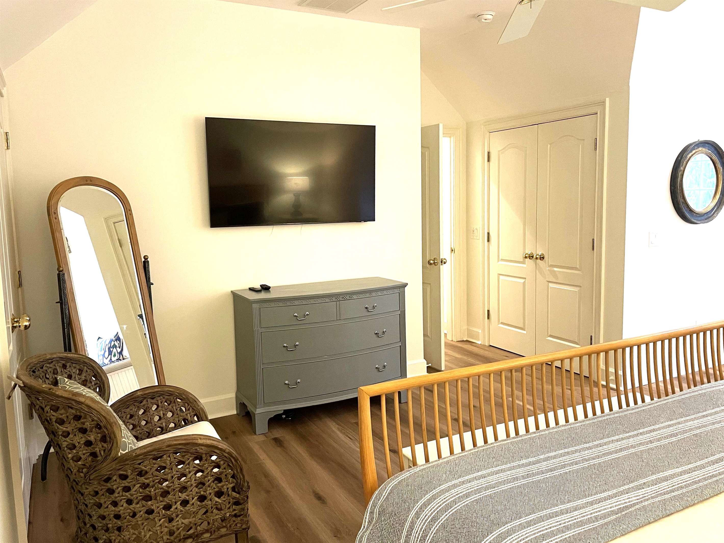 King bedroom with two closets (one shown) and a dresser