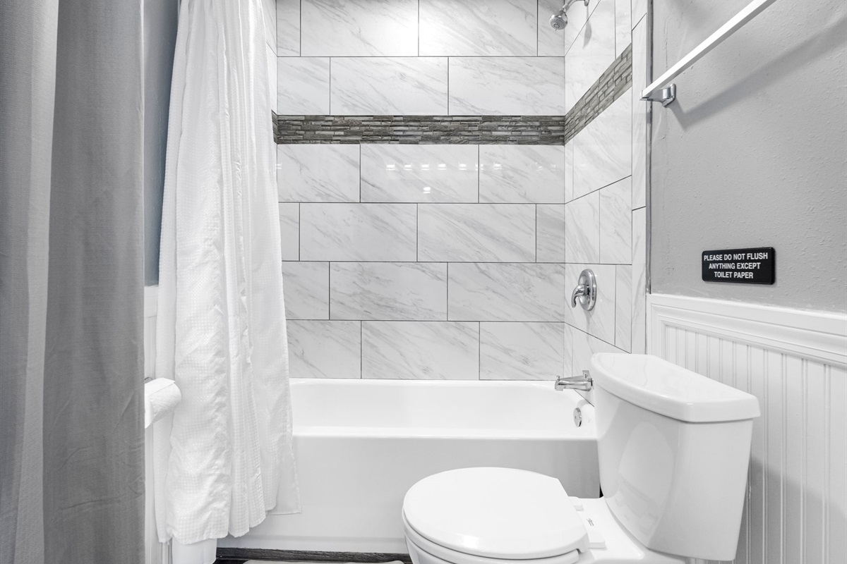 From the oversized vanity to the full-sized tub/shower combo, every detail is designed to elevate your daily routine with comfort and style.