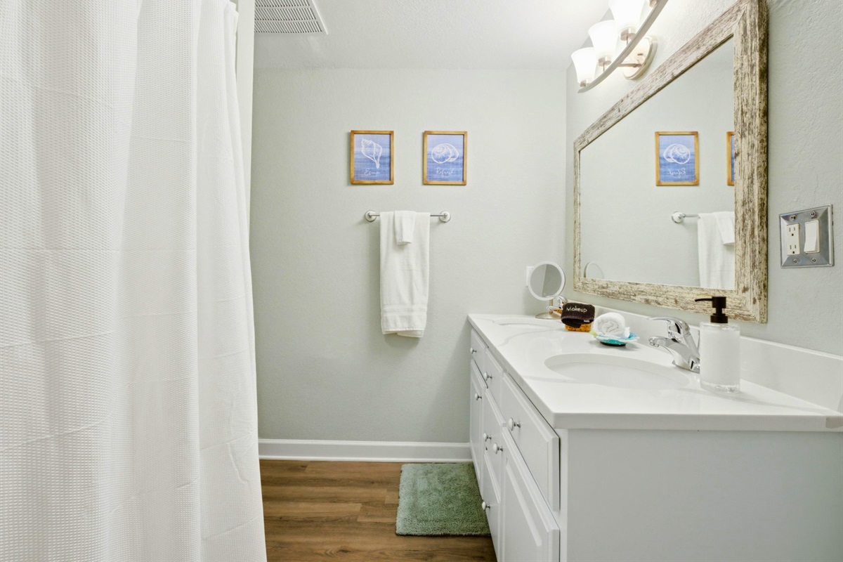 Bright, clean, and spacious, this bathroom makes it easy for everyone to get ready for the day ahead.