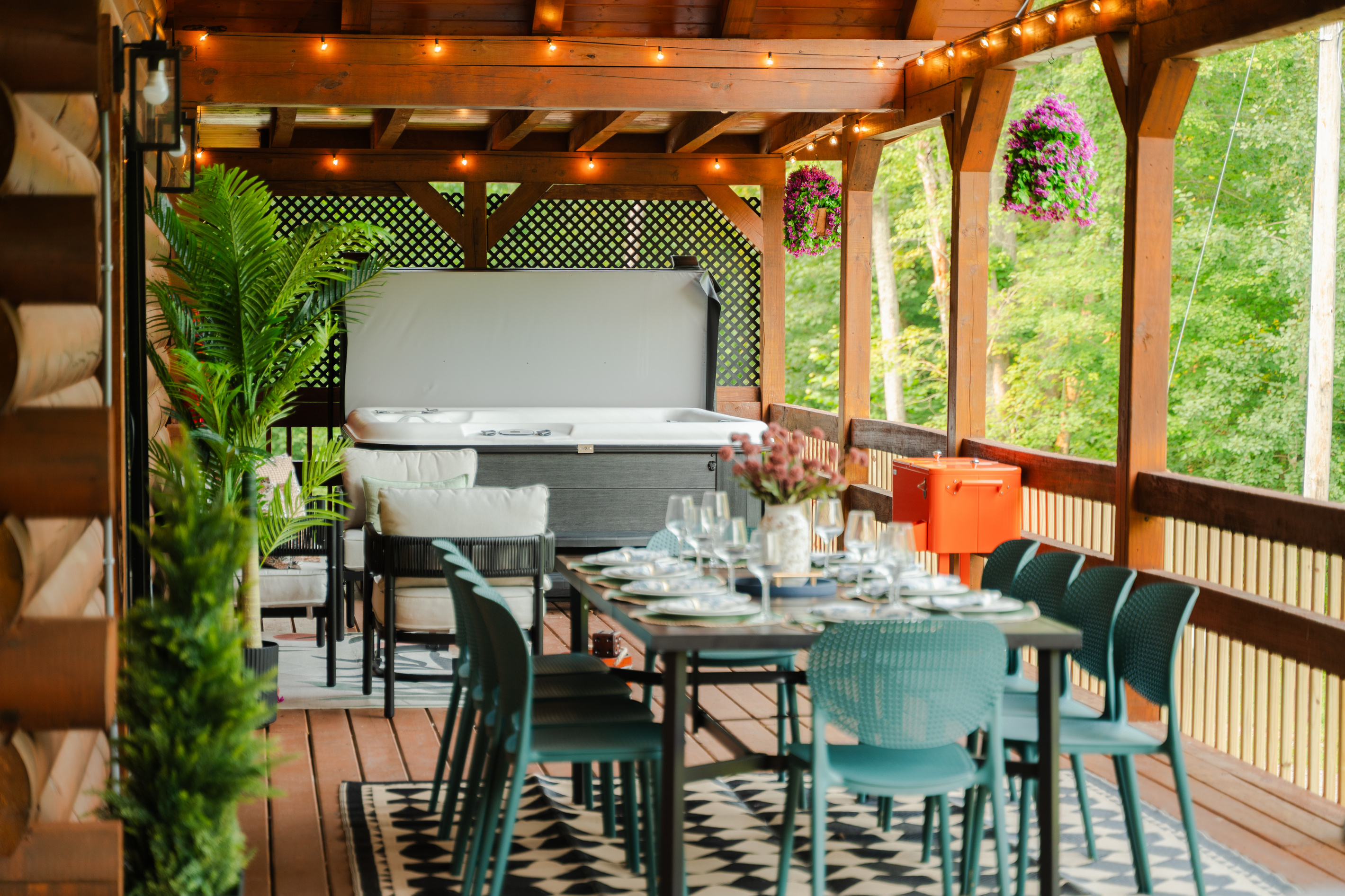 Soak in the hot tub while taking in the peaceful wooded setting.