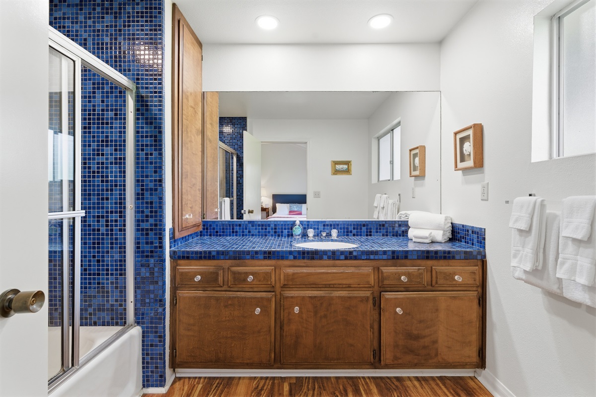 This bathroom is attached to the room with two queen beds