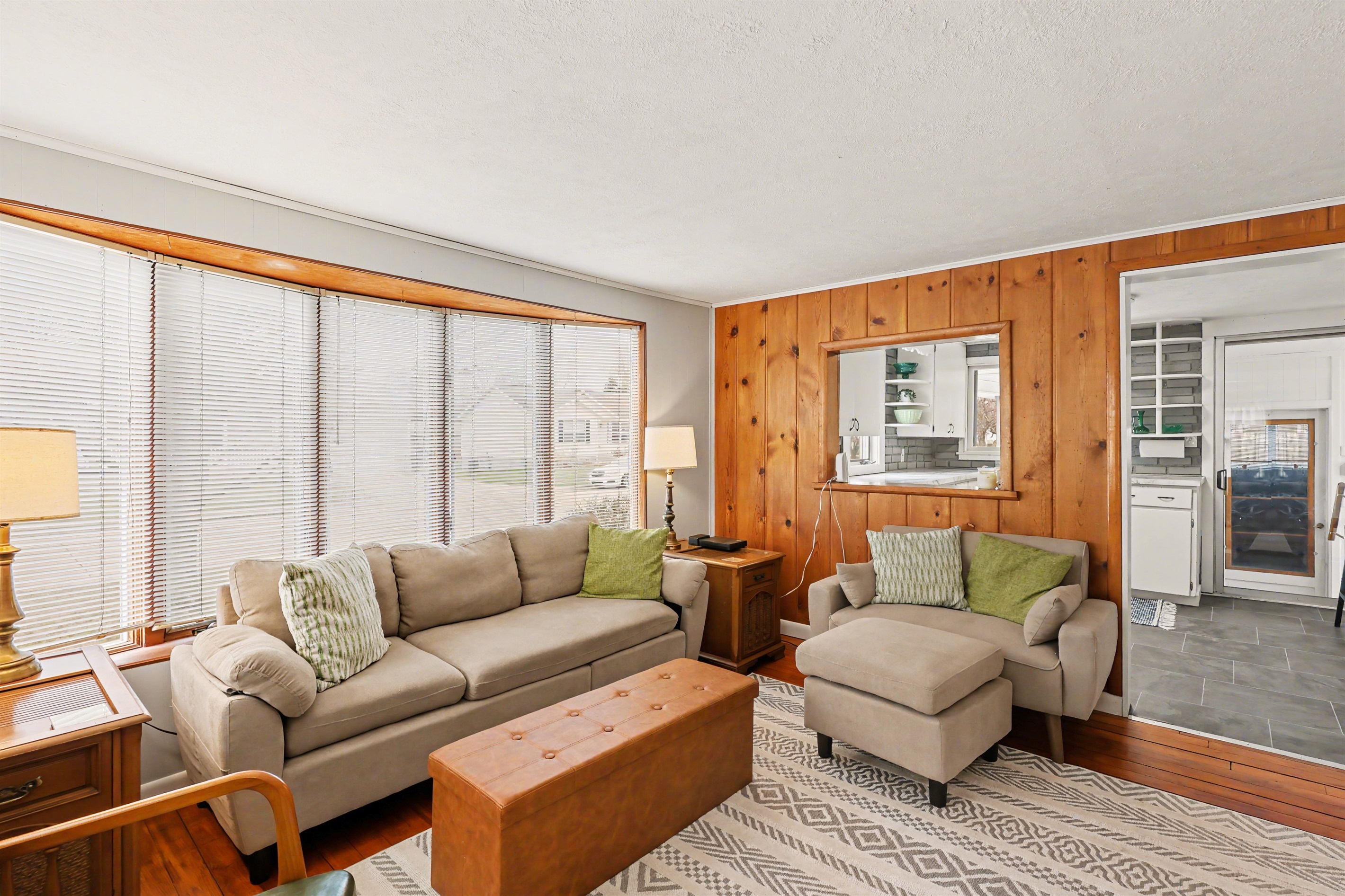 Living room, looking into the kitchen.