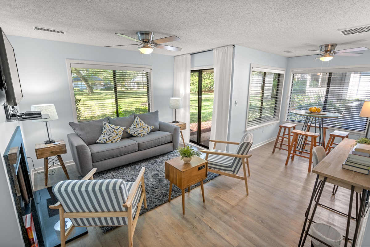 Cozy living room with Fireplace and access to back patio