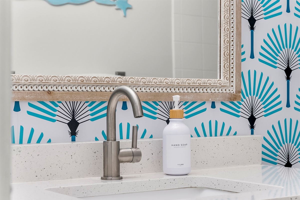Updated countertops and vanity provide you with an elevated experience while visiting PCB.