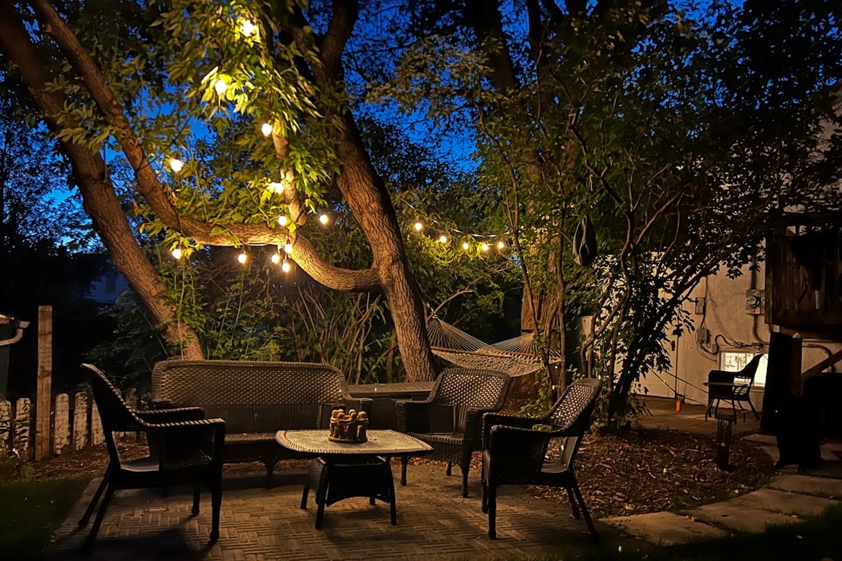 Cozy nights under the lights. The perfect spot for evening drinks and conversation.