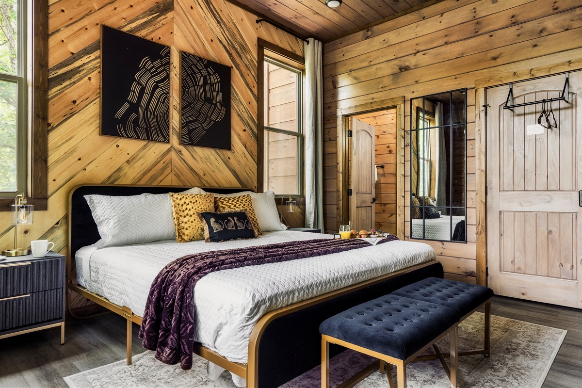 Bedroom 1: Master bedroom with king bed on main level with 58 inch Roku HDTV with en suite full bathroom