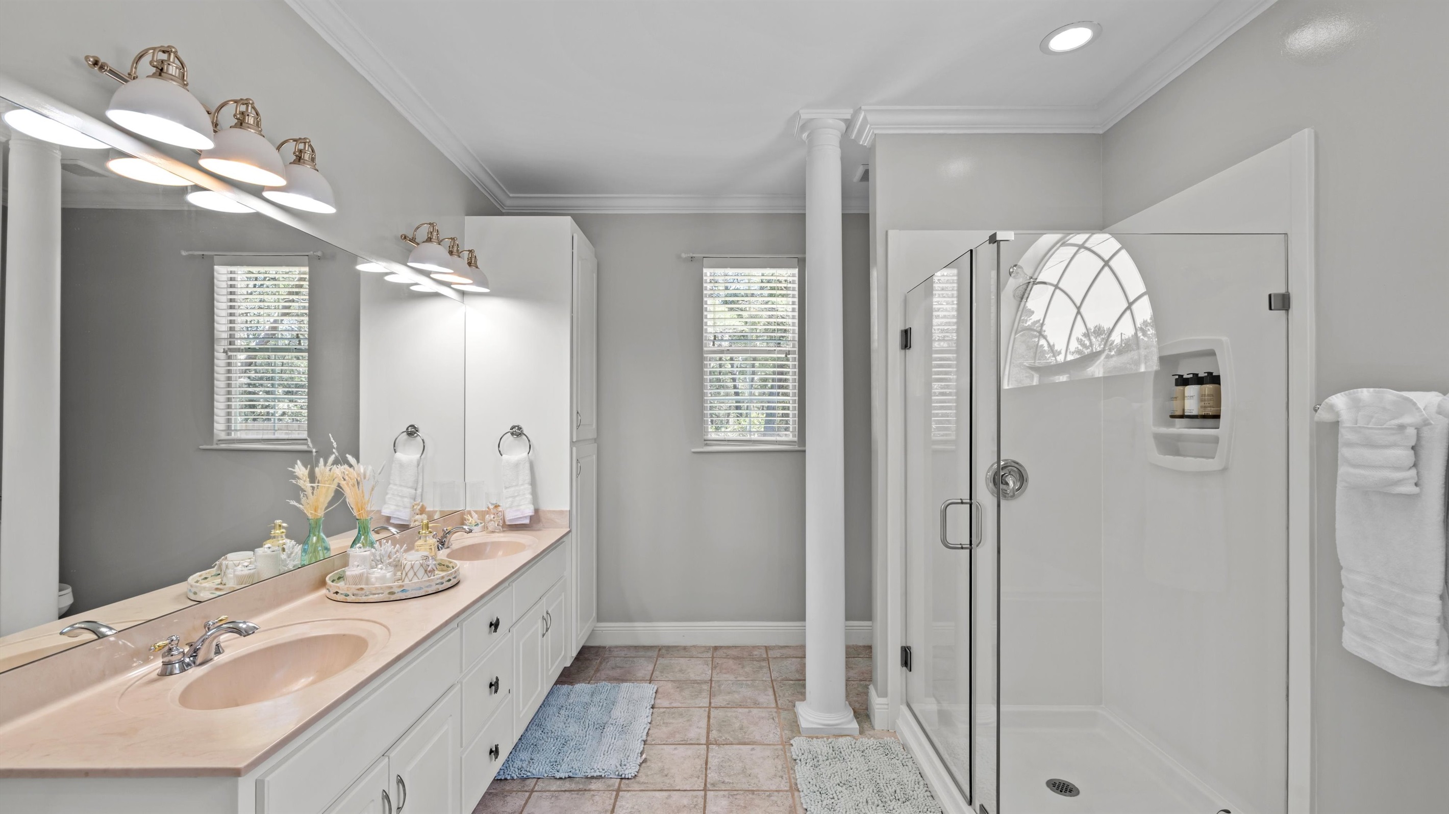 Clean, calm, and beachy — this spa-inspired bathroom is the perfect place to refresh and recharge.