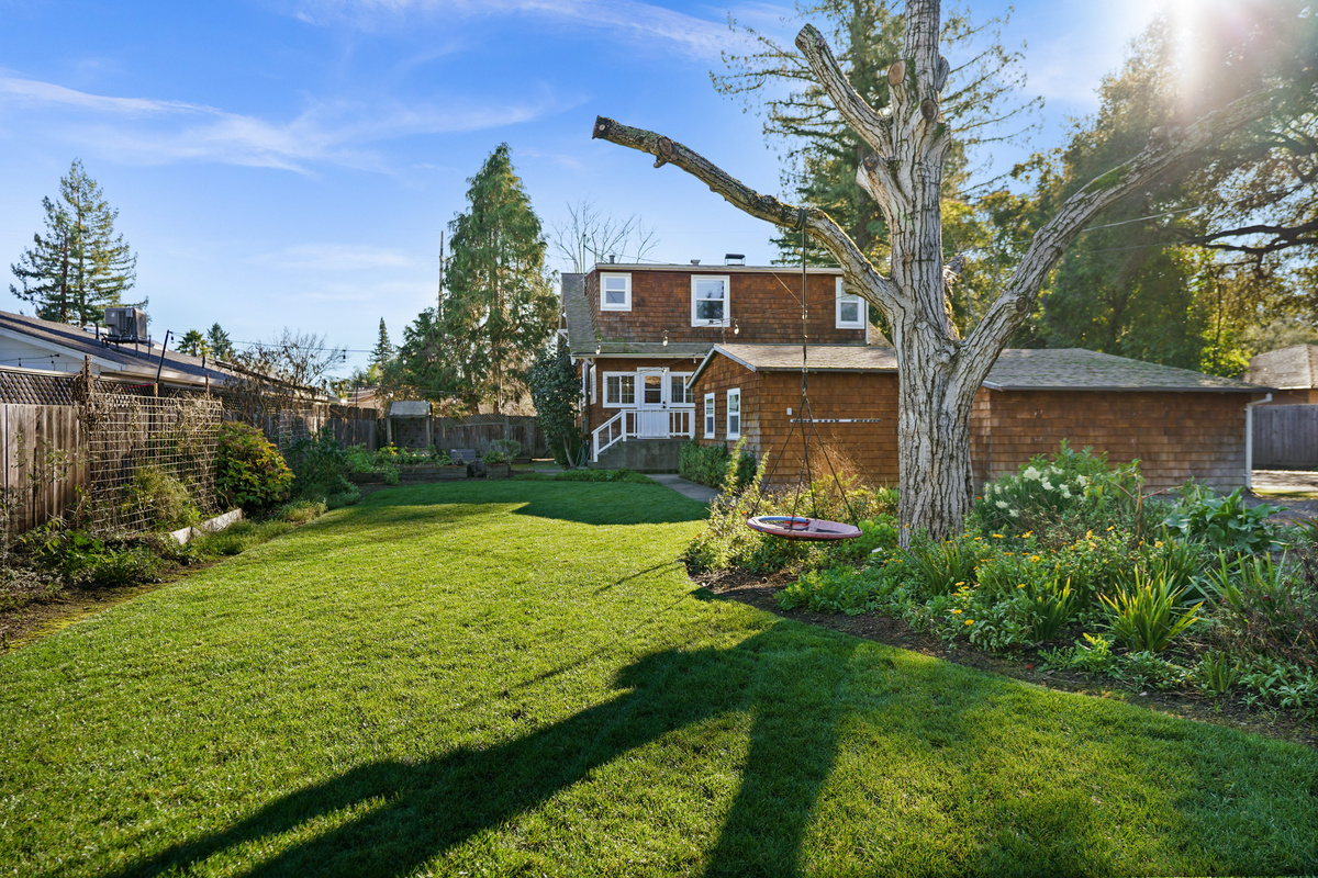 The spacious backyard offers plenty of room to relax, play, and enjoy the outdoors. Whether you're sipping your morning coffee, dining outside, or spending time with family and friends, it's the perfect place to unwind.
