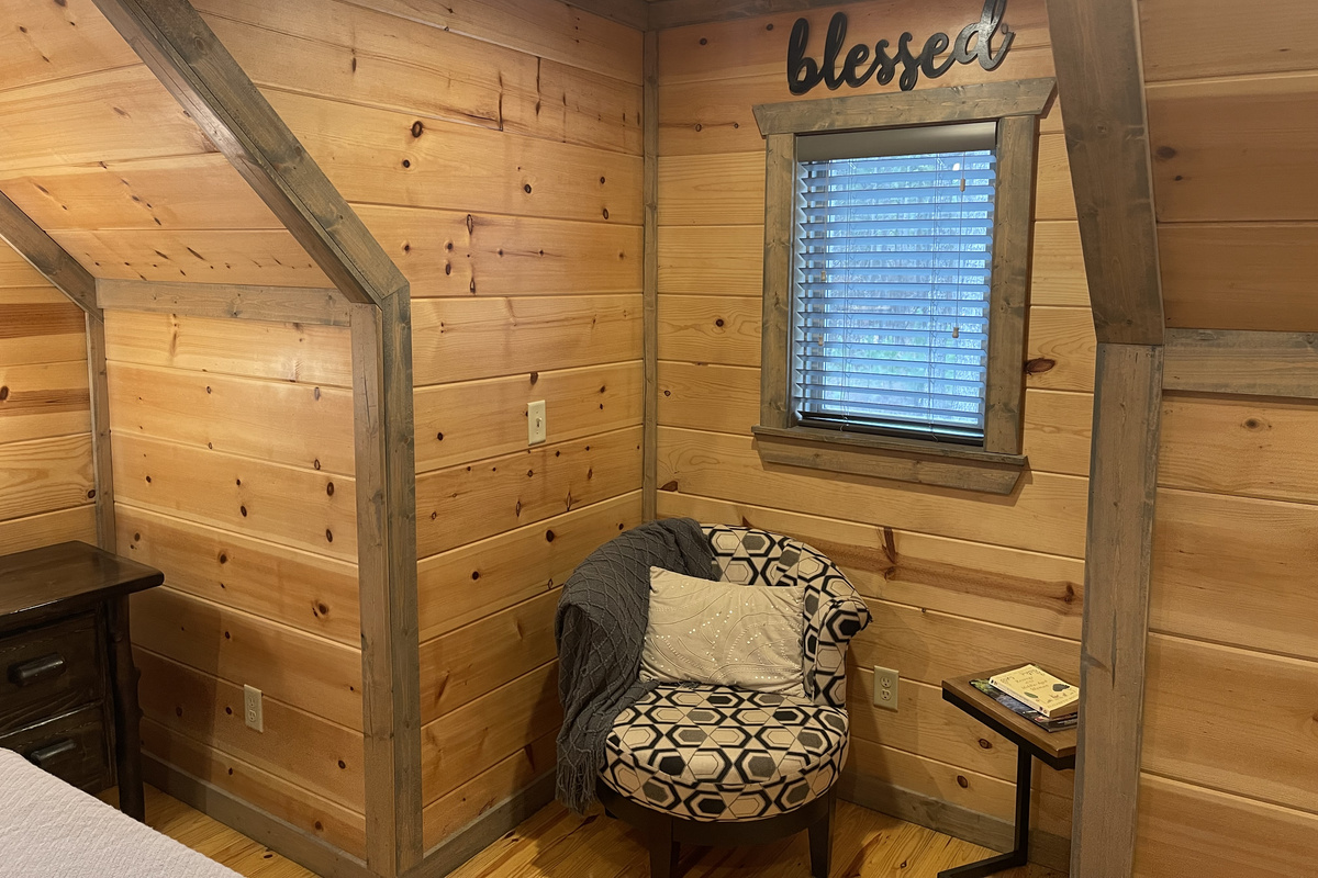 A quiet, comfortable reading nook tucked away in the upstairs Master bedroom #2