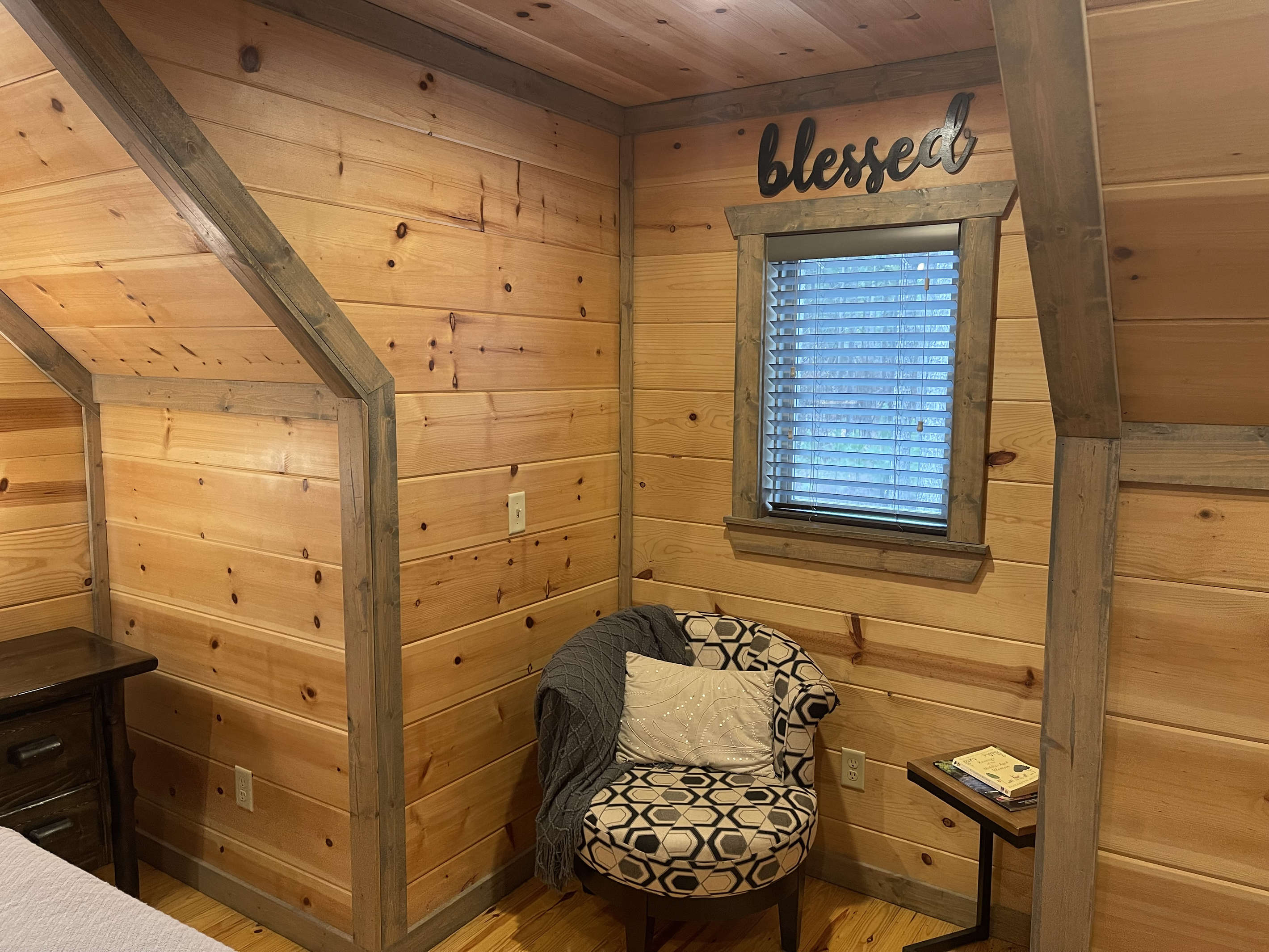 A quiet, comfortable reading nook tucked away in the upstairs Master bedroom #2