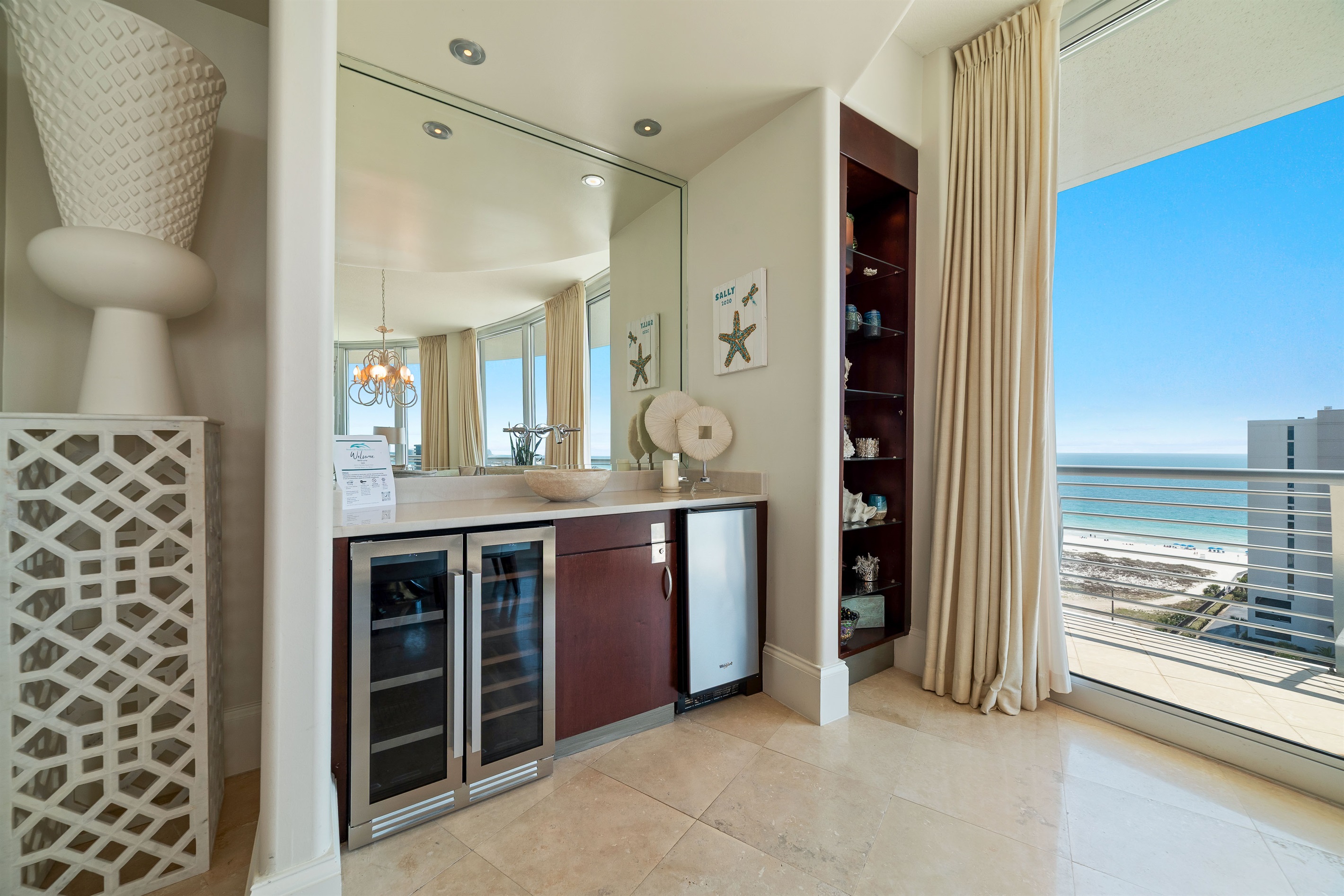 Elevate your entertaining experience with the convenience of this stylish wet bar. Perfect for crafting cocktails and keeping refreshments close at hand.